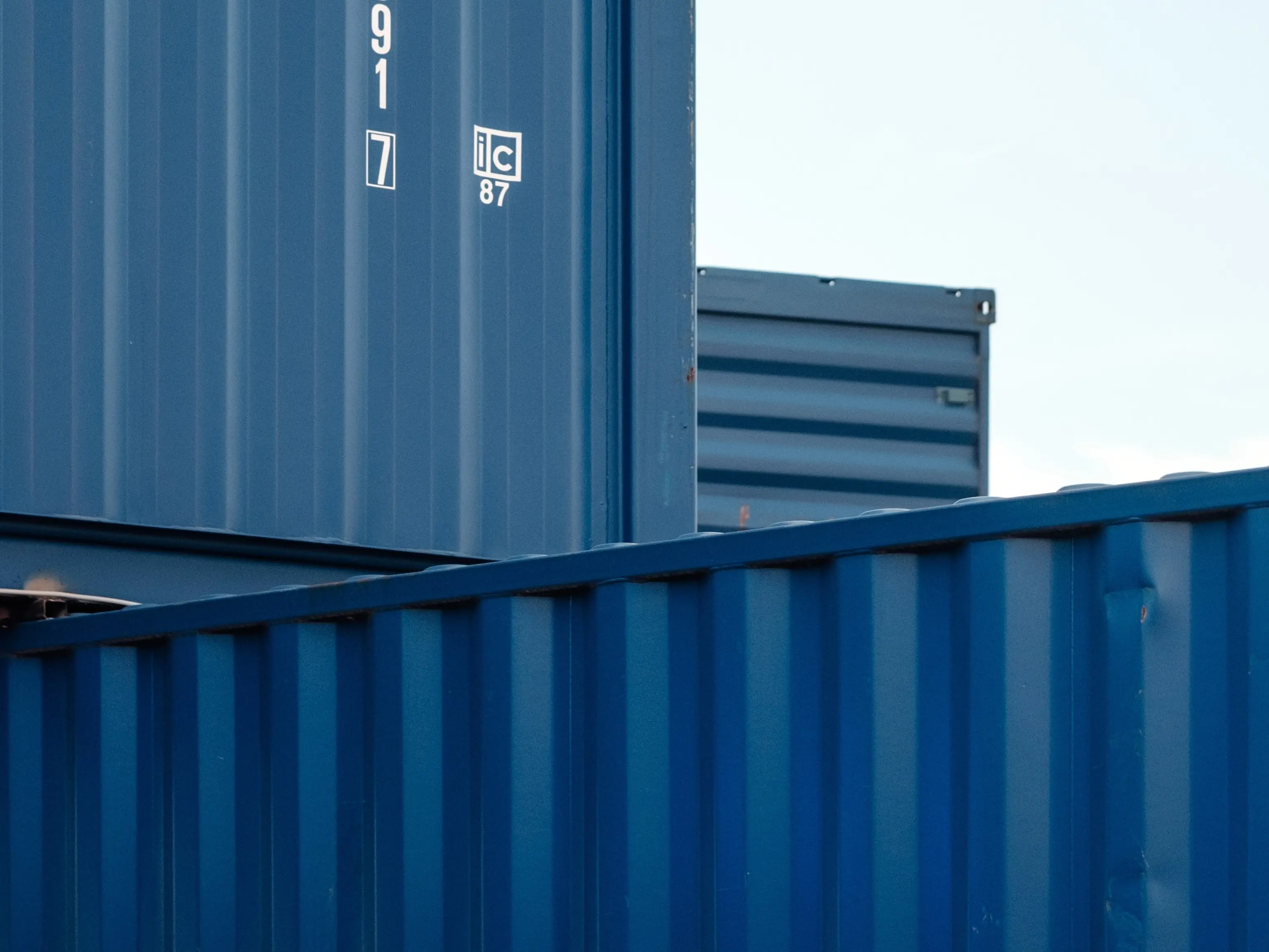 Shipping container crates stacked on each other.